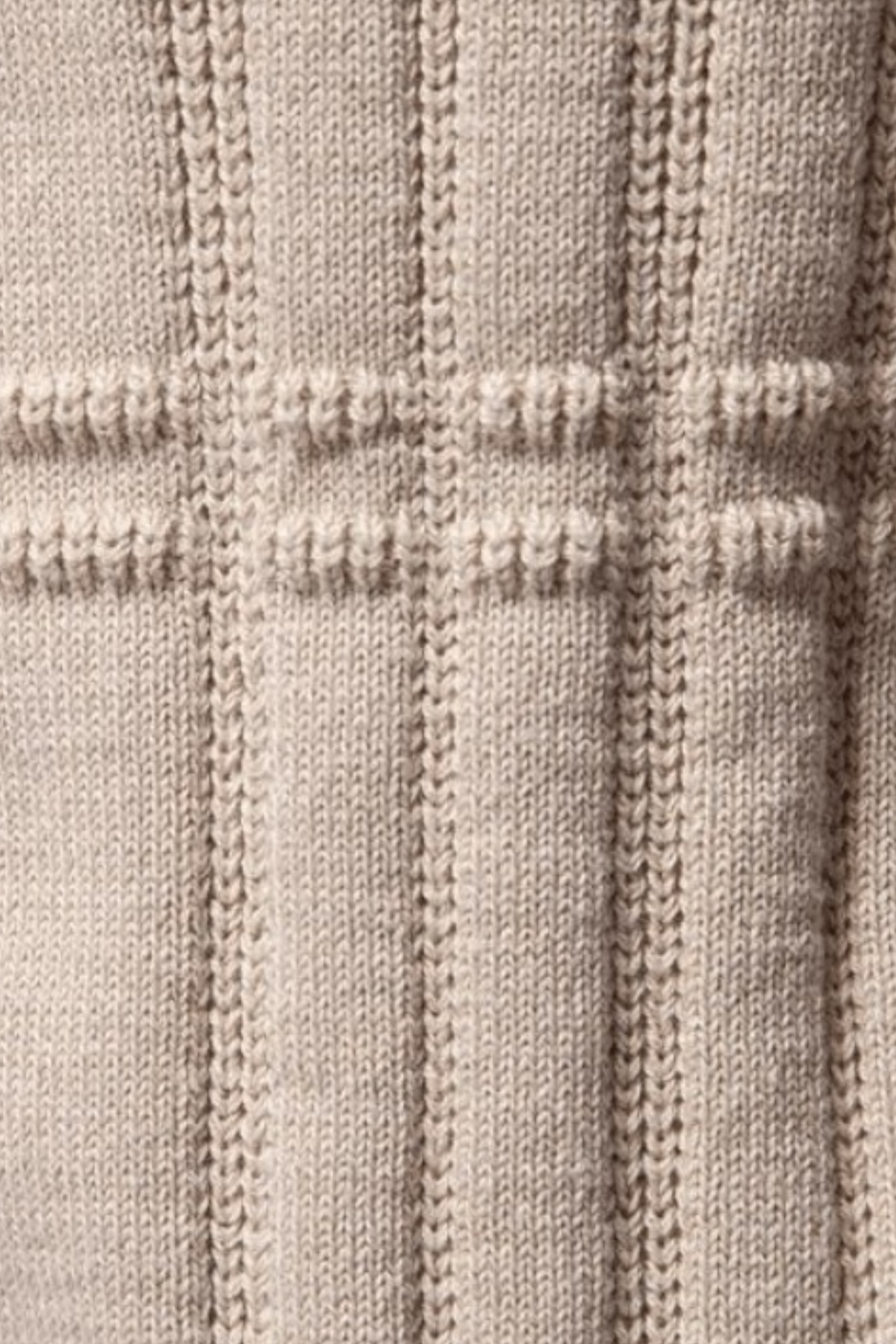 Suéter con patrones de rombos